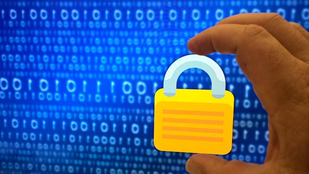 Laptop with privacy settings dashboard on screen